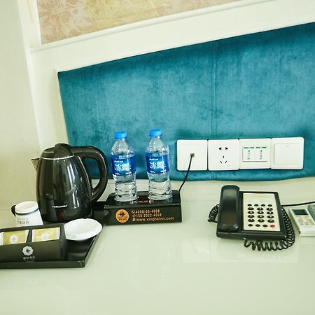 גואנגג'ואו Xinghe Xinfeng Hotel מראה חיצוני תמונה