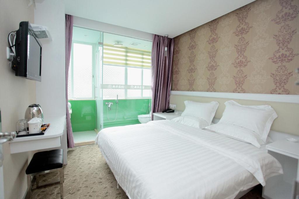 גואנגג'ואו Xinghe Xinfeng Hotel חדר תמונה