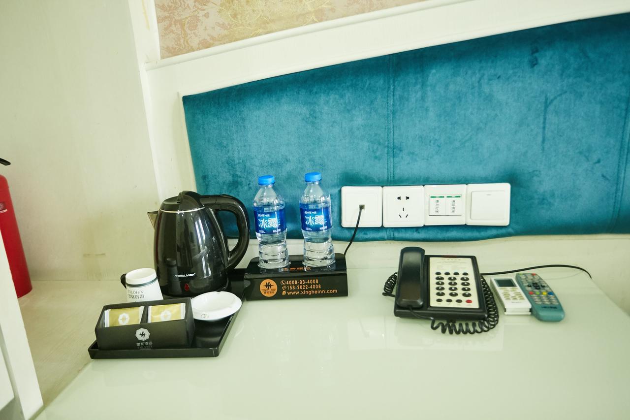 גואנגג'ואו Xinghe Xinfeng Hotel מראה חיצוני תמונה