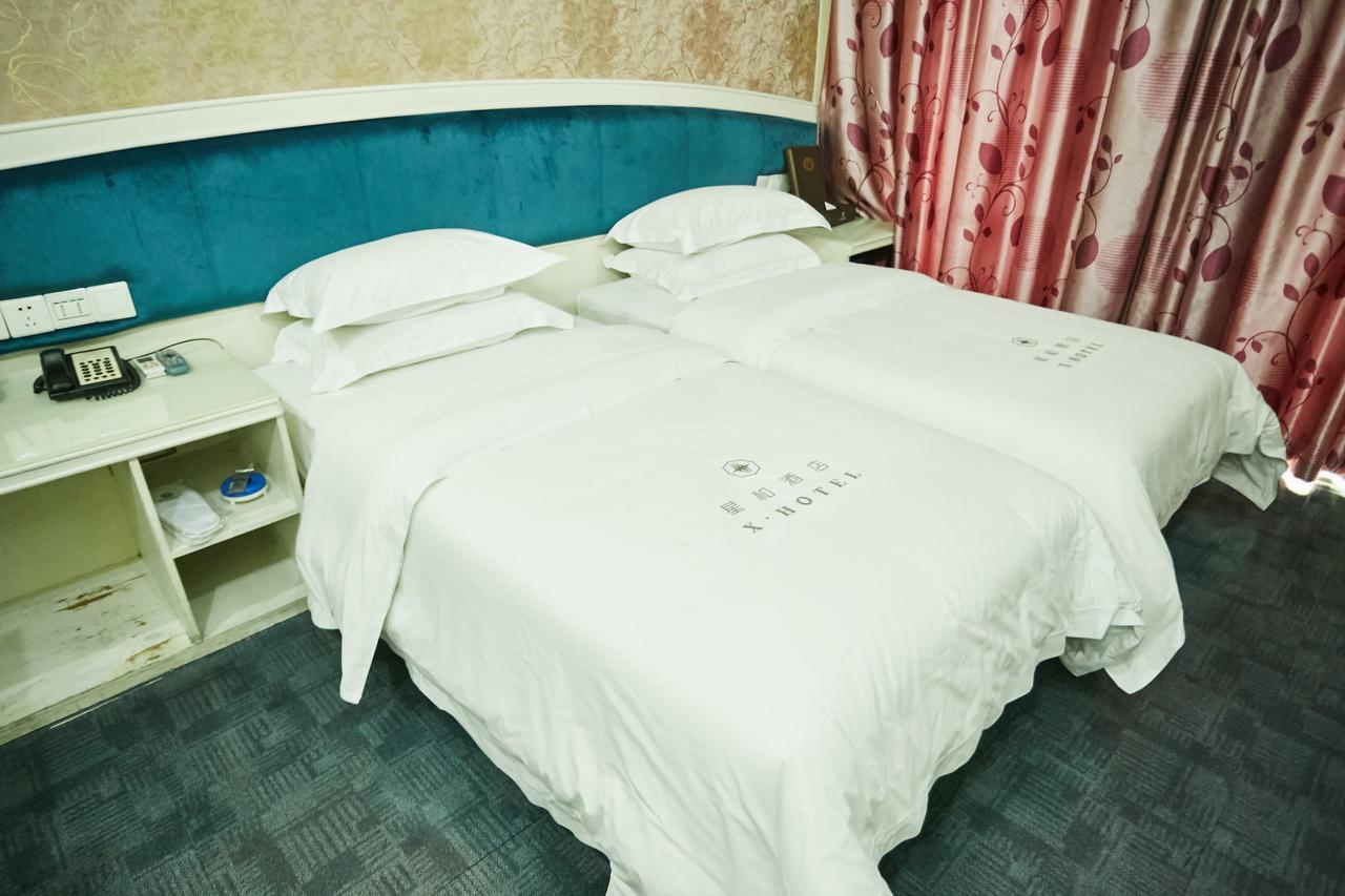 גואנגג'ואו Xinghe Xinfeng Hotel מראה חיצוני תמונה