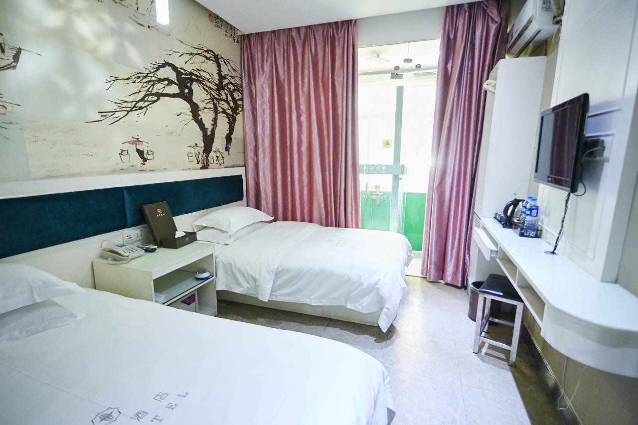 גואנגג'ואו Xinghe Xinfeng Hotel מראה חיצוני תמונה